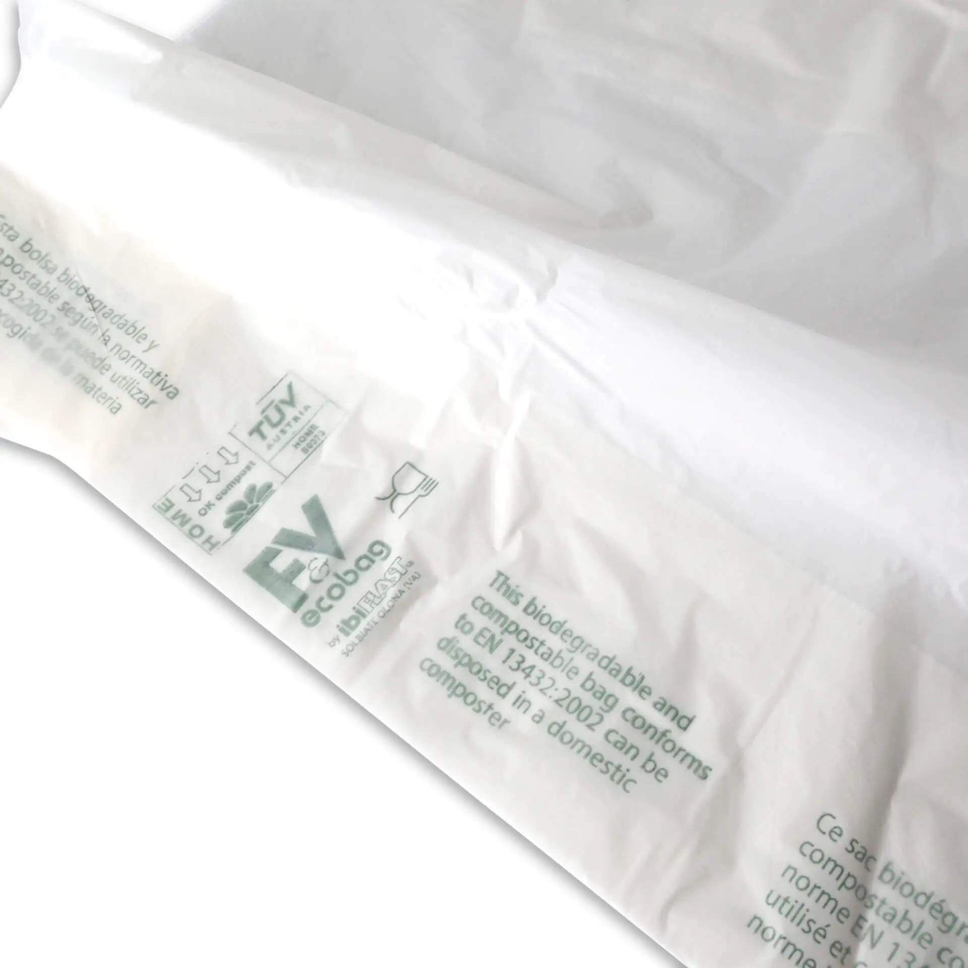 Biodegradowalna torba na zakupy z bioplastiku Mater-Bi®; z ekologicznymi oznaczeniami i wymiarami 22 + 13 x 50 cm.