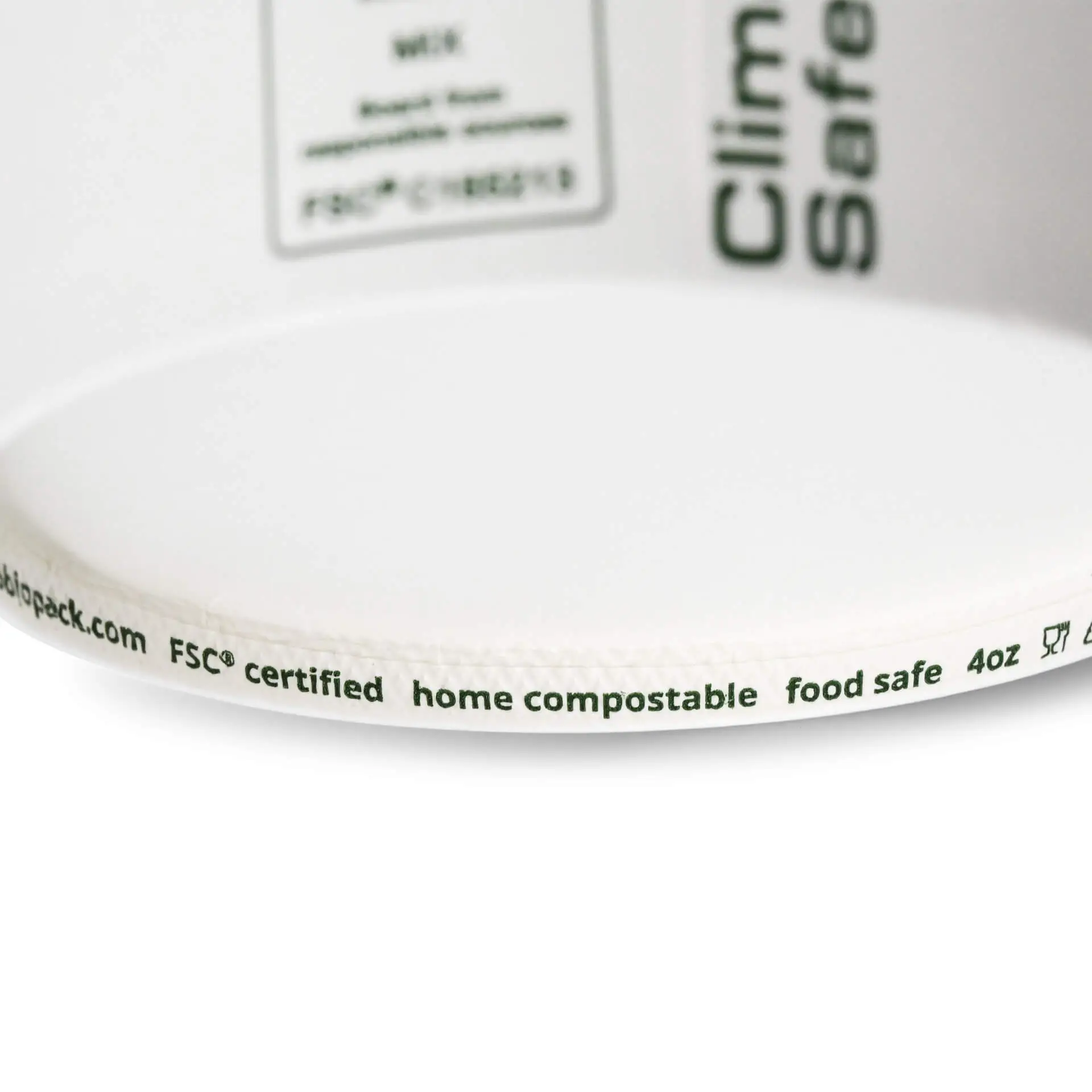 Biały kubek do lodów 4 oz z powłoką PE; posiada etykietę wskazującą, że jest kompostowalny w domu i bezpieczny dla żywności.