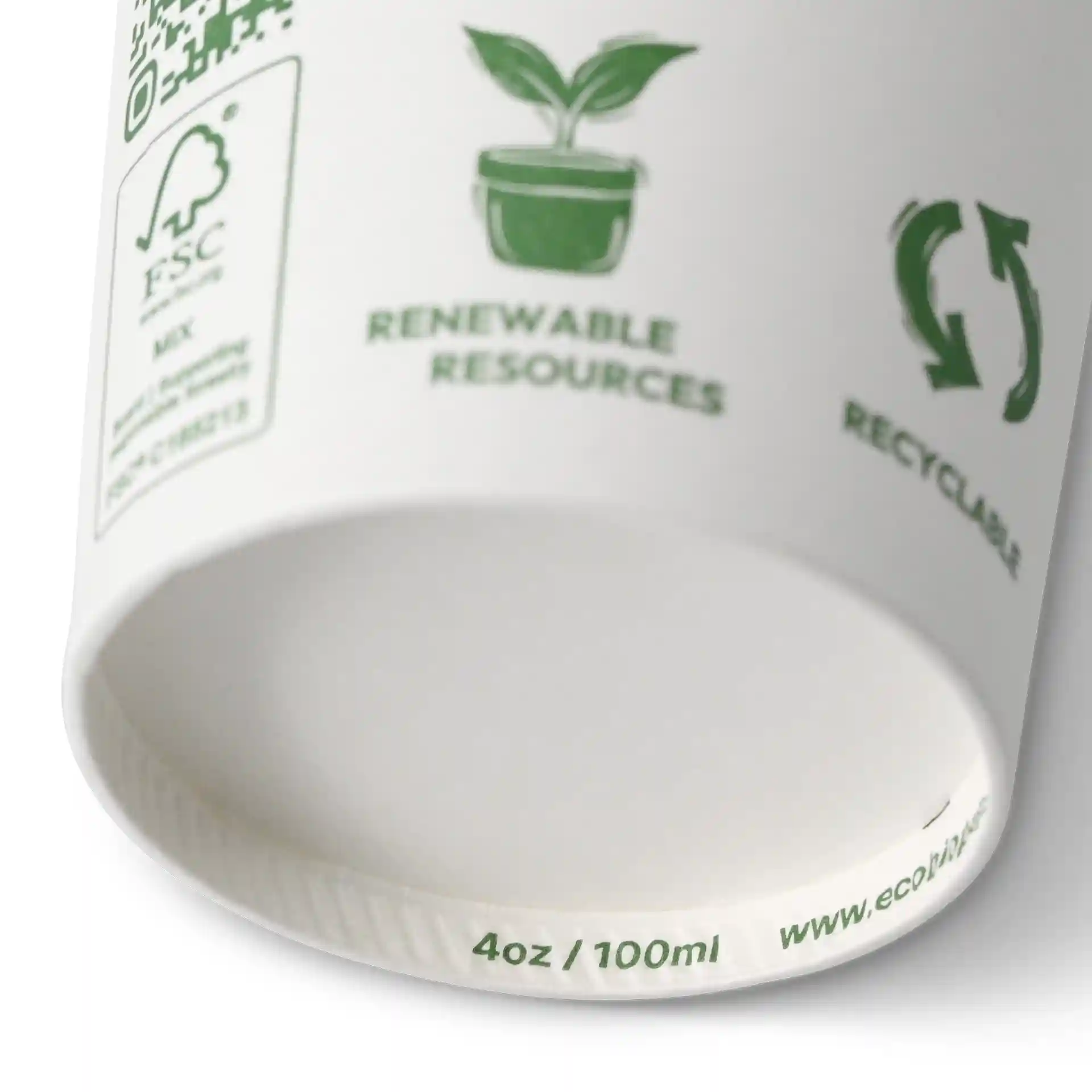 Biały kubek papierowy z zielonymi ikonami, pokazuje roślinę, symbol recyklingu i wymiary 4 oz / 100 ml na dnie.
