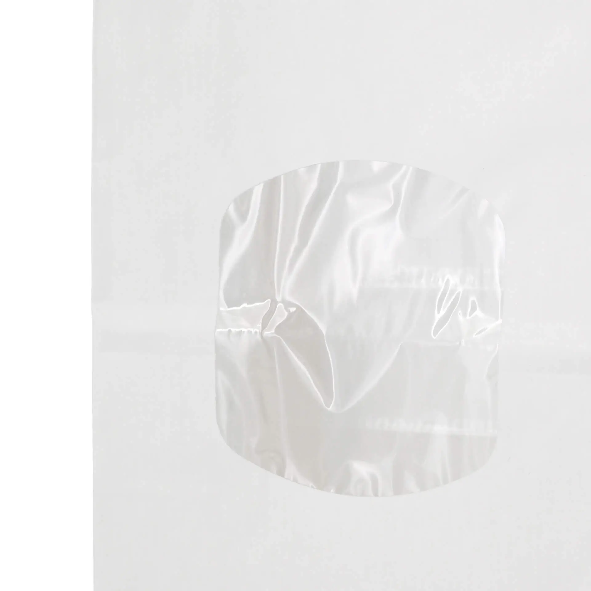 Biały papierowy worek z blokowym dnem i przezroczystym oknem oraz z drucikiem; zaprojektowany do aromatycznych produktów. Wymiary 11,5 x 7 x 24,5 cm.