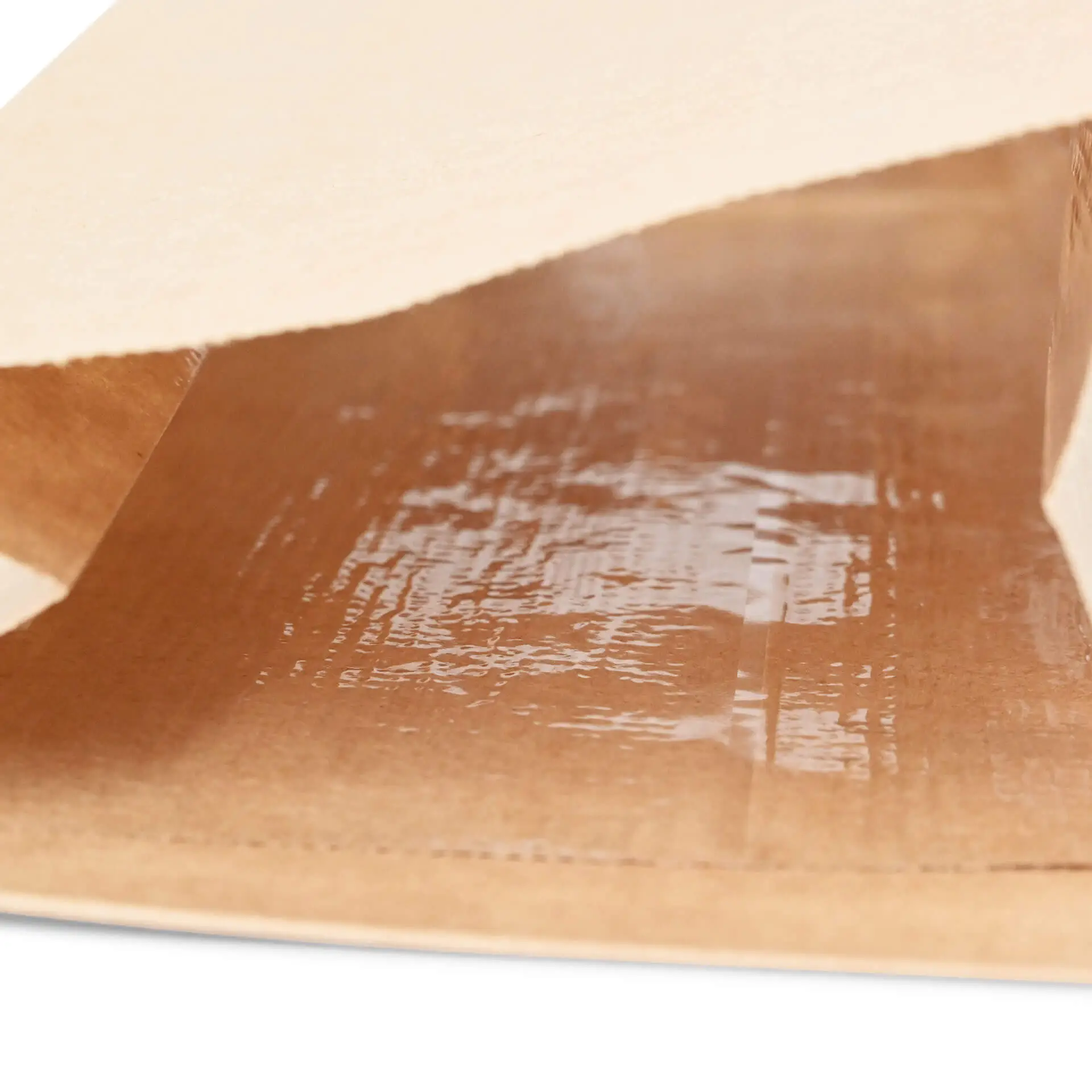 Brązka torba papierowa z dnem blokowym i przezroczystym oknem, pokazująca wewnętrzną stronę pokrytą PP. Odpowiednia do aromatycznych towarów.