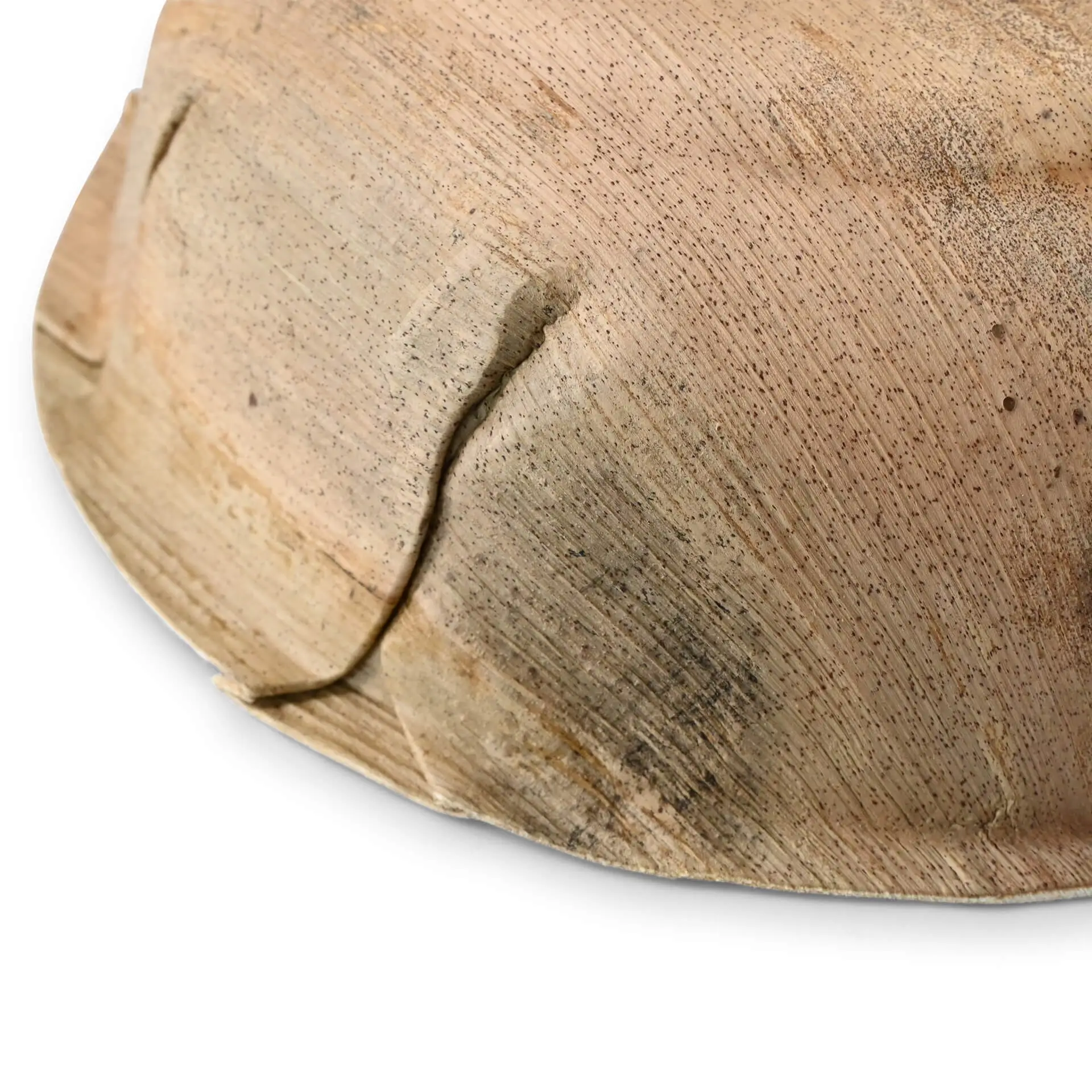 Miseczka wykonana z liści palmowych, z naturalnym słojem, odporna na wilgoć i tłuszcz, z unikalną teksturą.