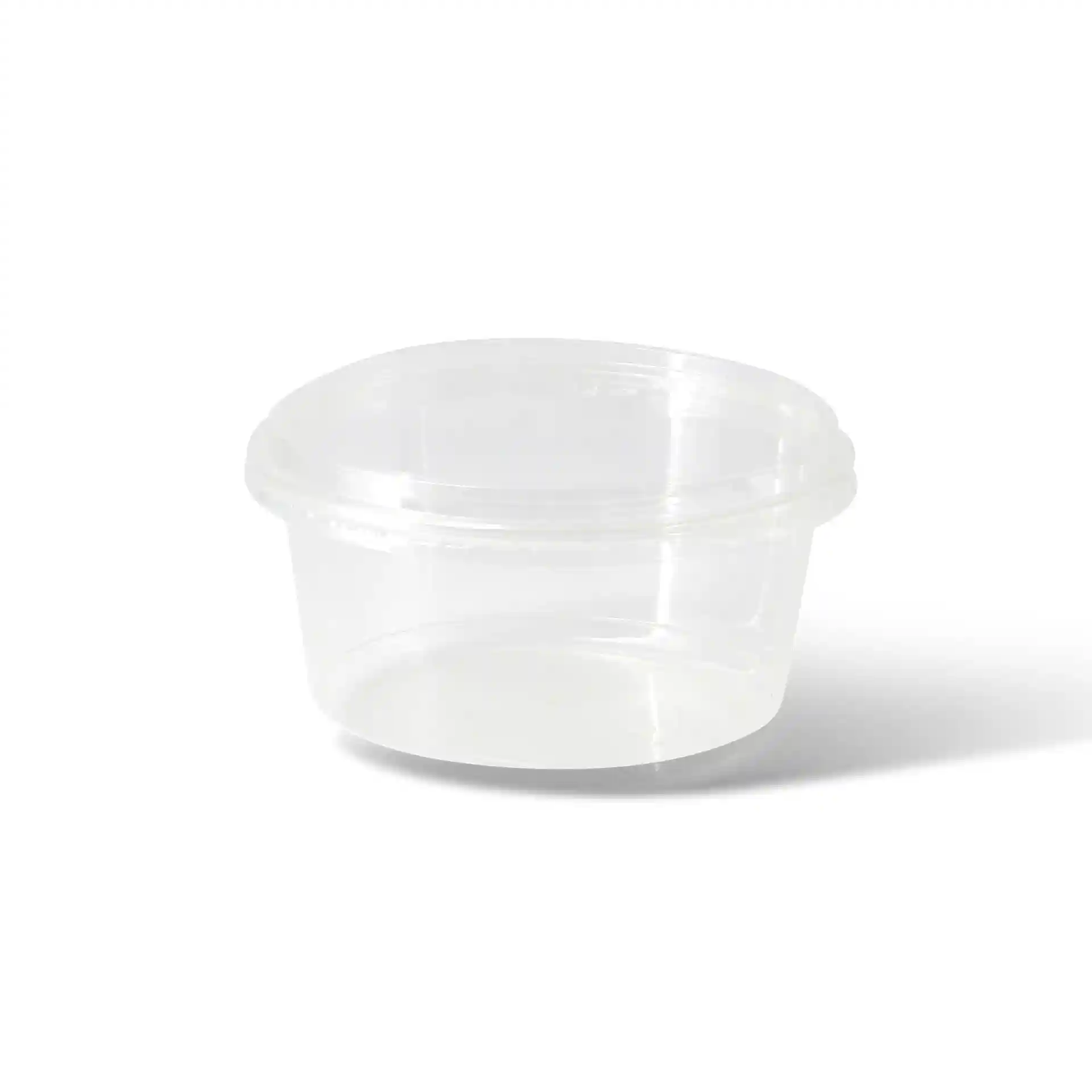 Przezroczysty okrągły pojemnik deli o pojemności 700 ml i średnicy 143 mm.