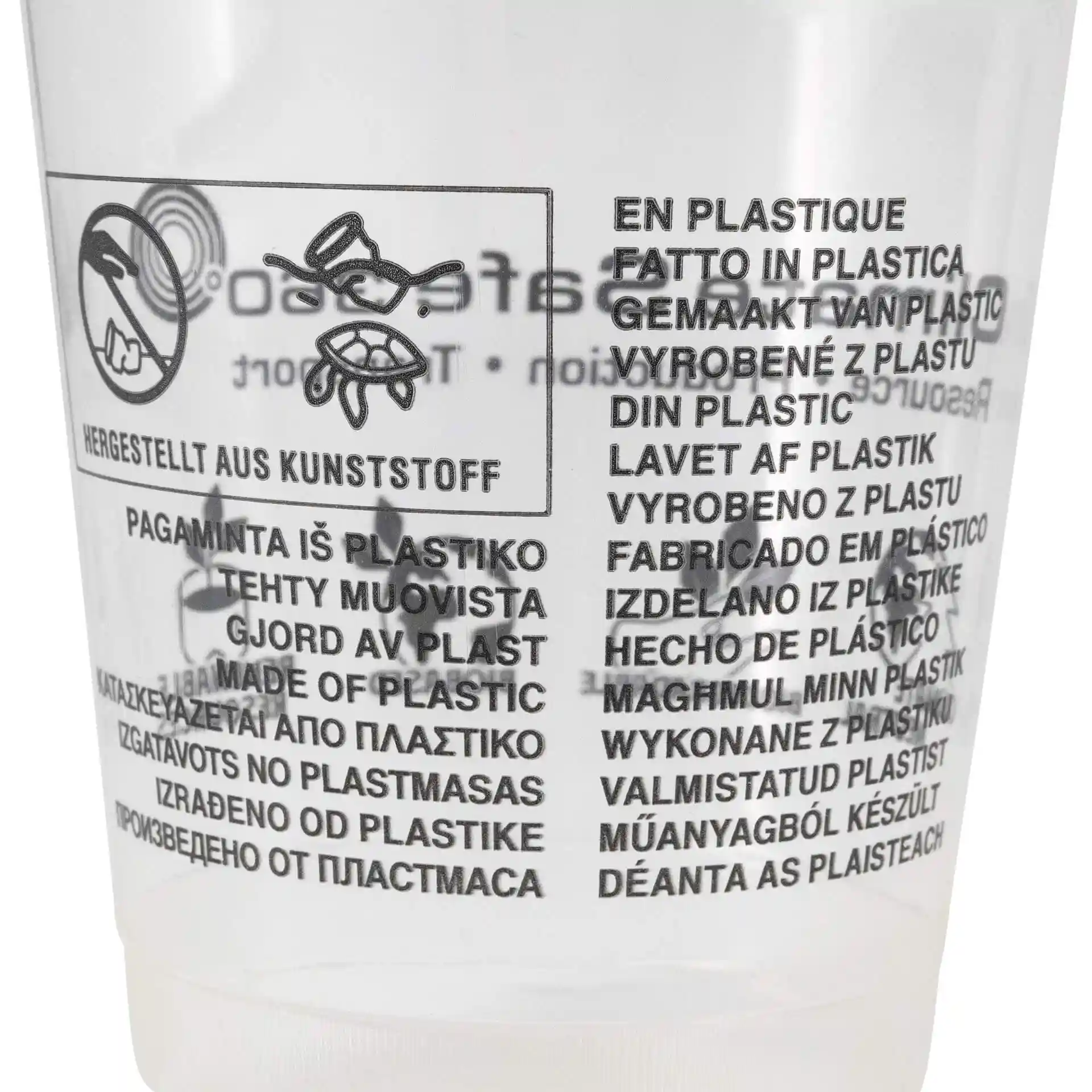 Przezroczysty kubek z nadrukiem wielojęzycznym o materiale plastikowym i instrukcjach użytkowania.