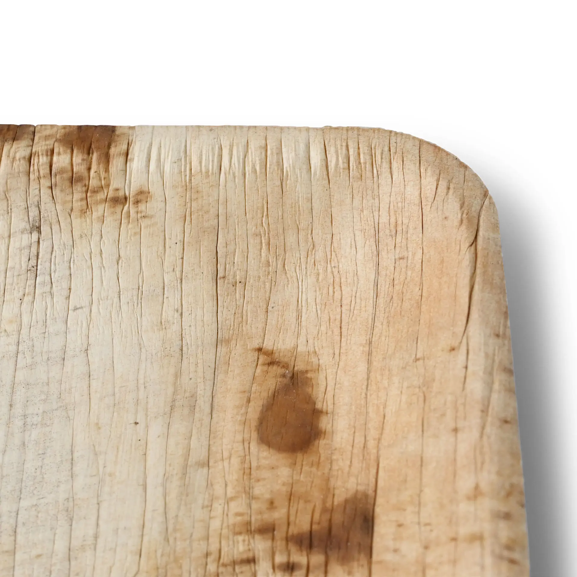 Naturalna talerz z liścia palmy o jasnym usłojeniu, z zaokrąglonymi krawędziami, odpowiedni do serwowania jedzenia.